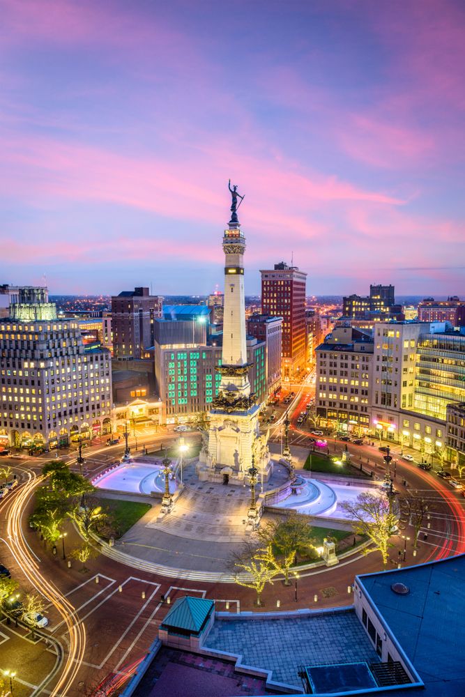 Monument Circle lit up during twilight
