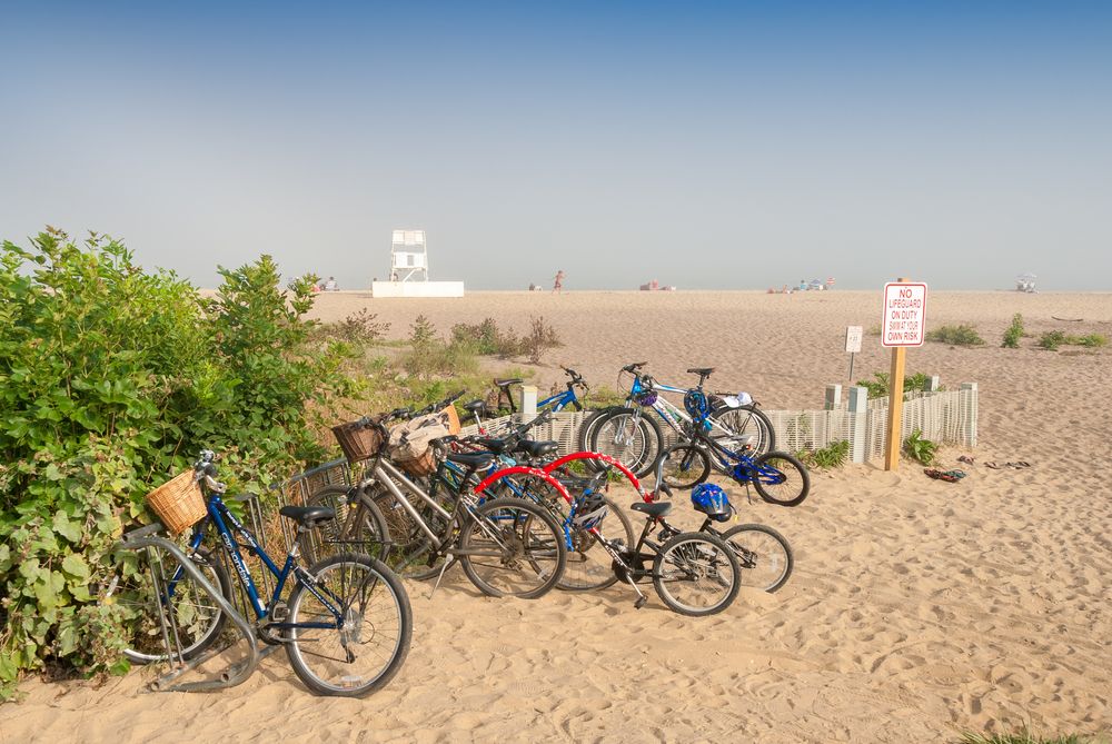 Bikes parked at a beach sand