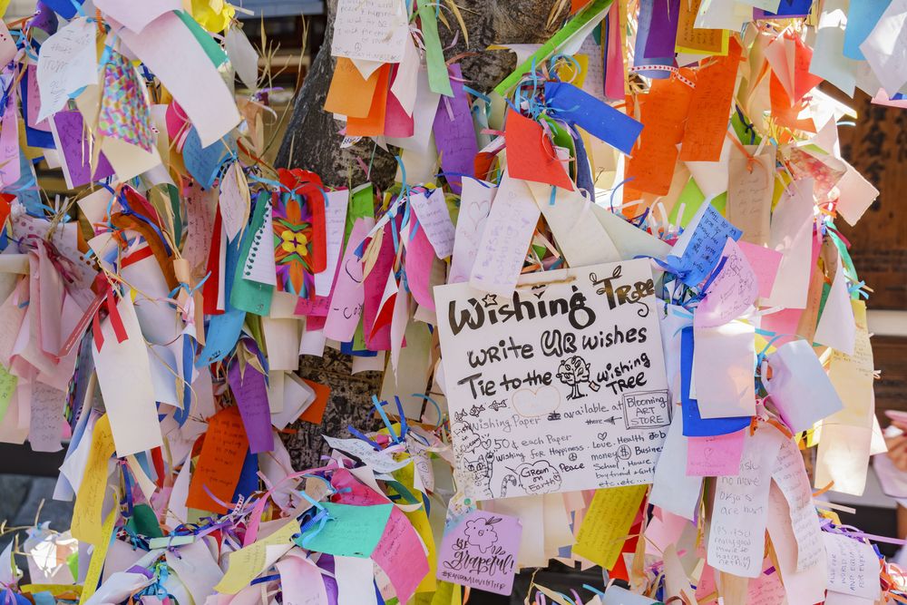 A wishing tree filled with pieces of colorful paper at Nisei Week