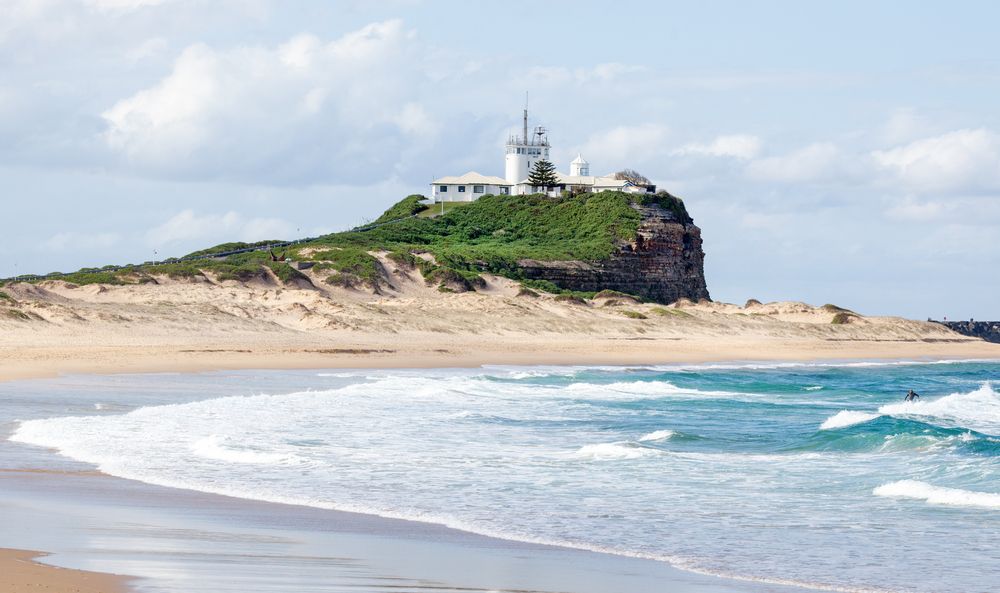 Nobby's Lighthouse with beach in the foreground