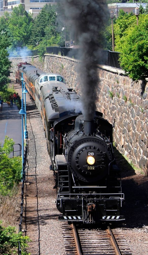 A train passing along the North Shore Scenic Railroad