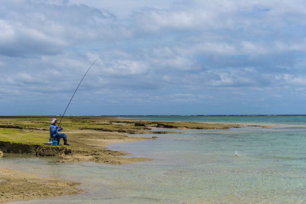 A person fishing at Okinawa's waters