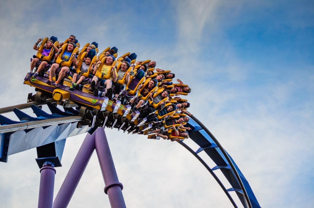 Passengers on a rollercoaster at Six Flags Adventure Park