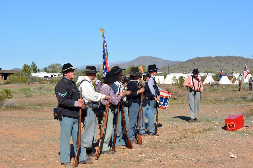 Campers with riffles at Pioneer Arizona Living History Museum