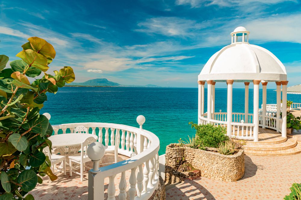 White Gazebo with a view of the ocean and mountains at Puerto Plata