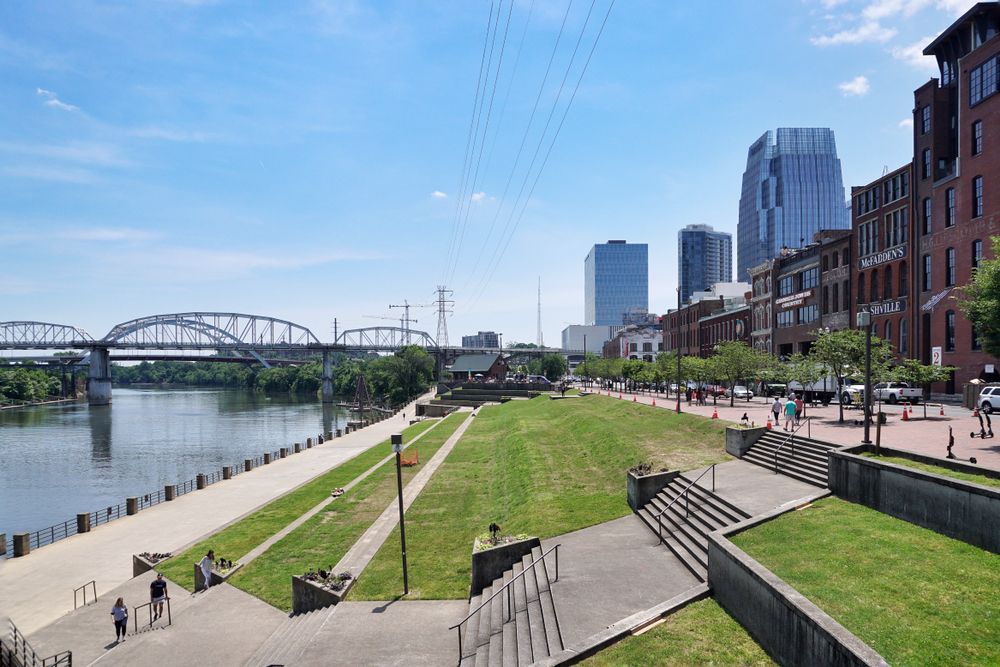 People walking around the Riverfront Park