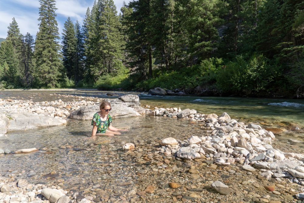 A woman enjoying the hot spring at Sacajawea Park