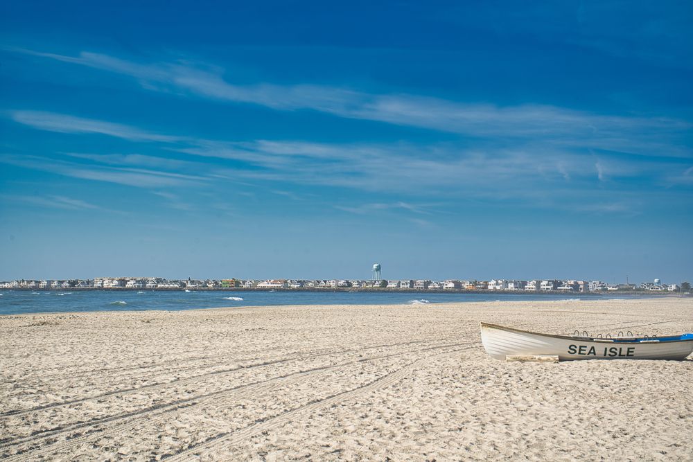 A boat on the sand at Sea Isle City Beach.
