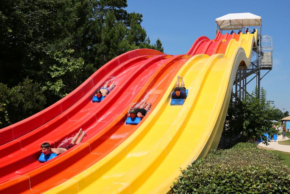 Visitors enjoying the water slide at Splash in the Boro Waterpark and Aquatics Center
