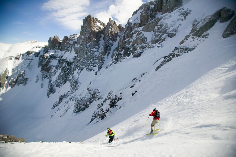 People skiing downhill at Telluride Ski Resort