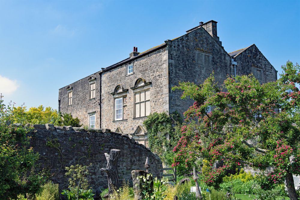 Thornton Hall Gardens surrounded by plants and trees at Darlington