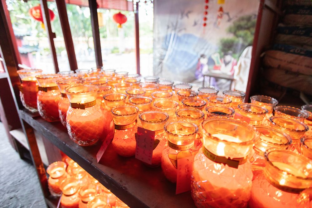 Lit up candles at Tua Pek Kong Chinese Temple