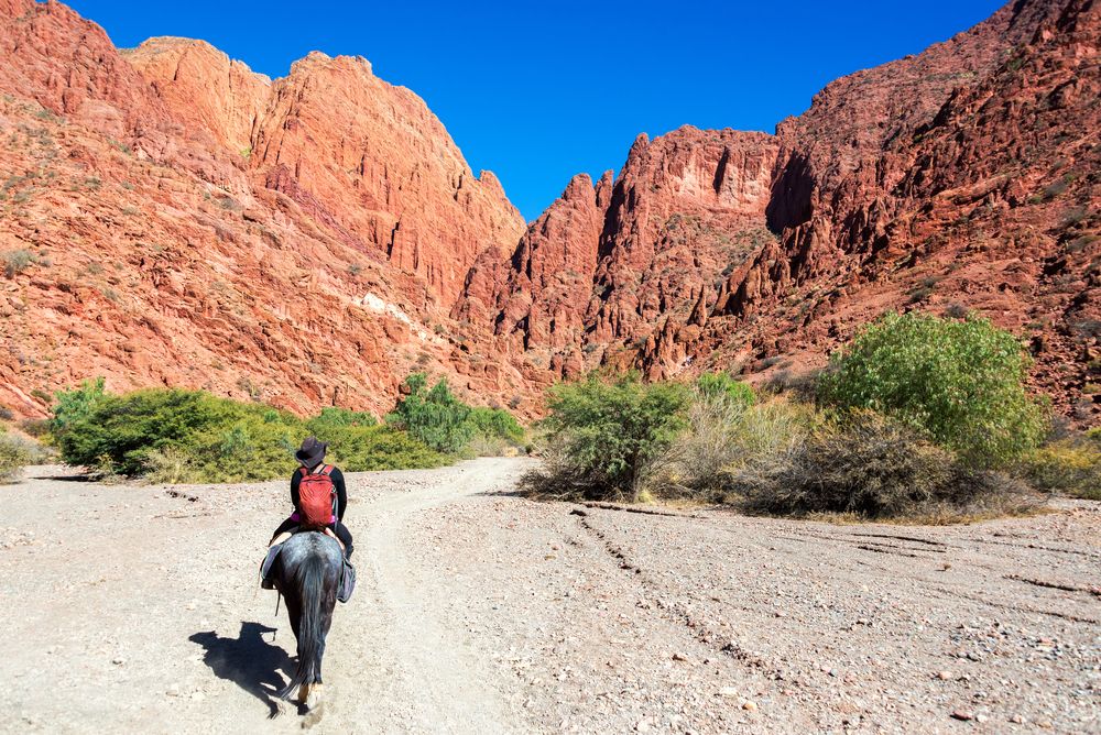 Women riding a horse in Tupiza