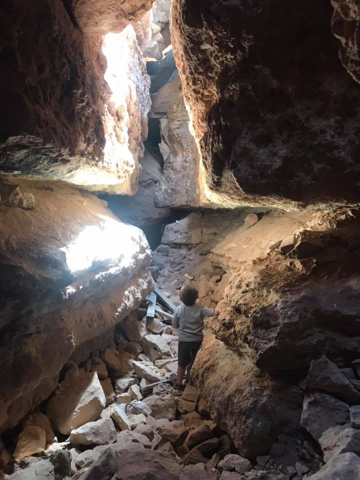 View of Apache Death Cave with a Kid
