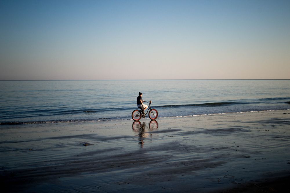 Bicycle ride along Tybee Island beach