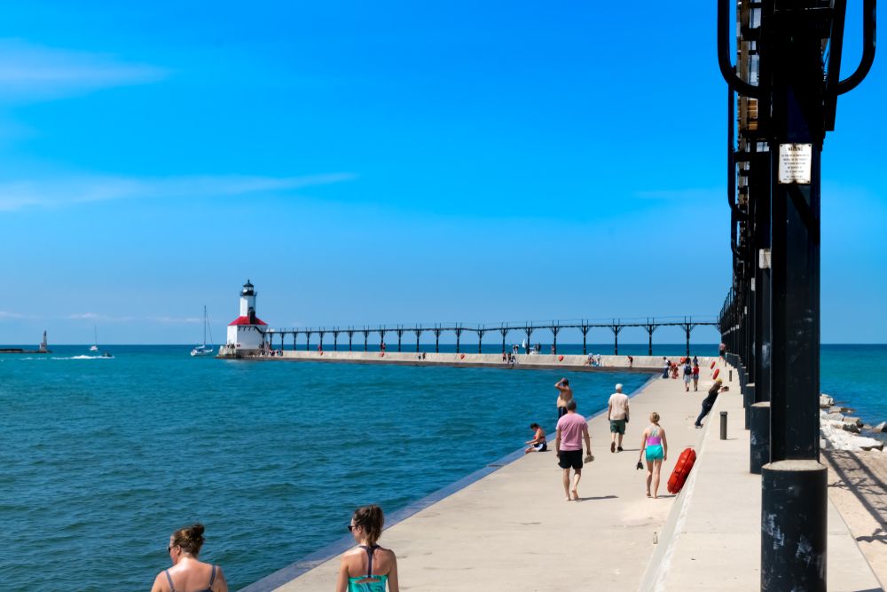 People strolling on the pier at Washington Park and Beach
