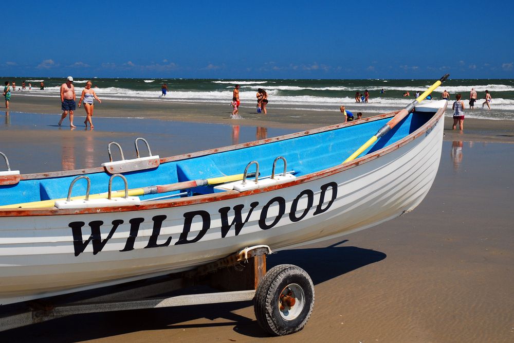 A wooden boat on Wildwood Beach shore