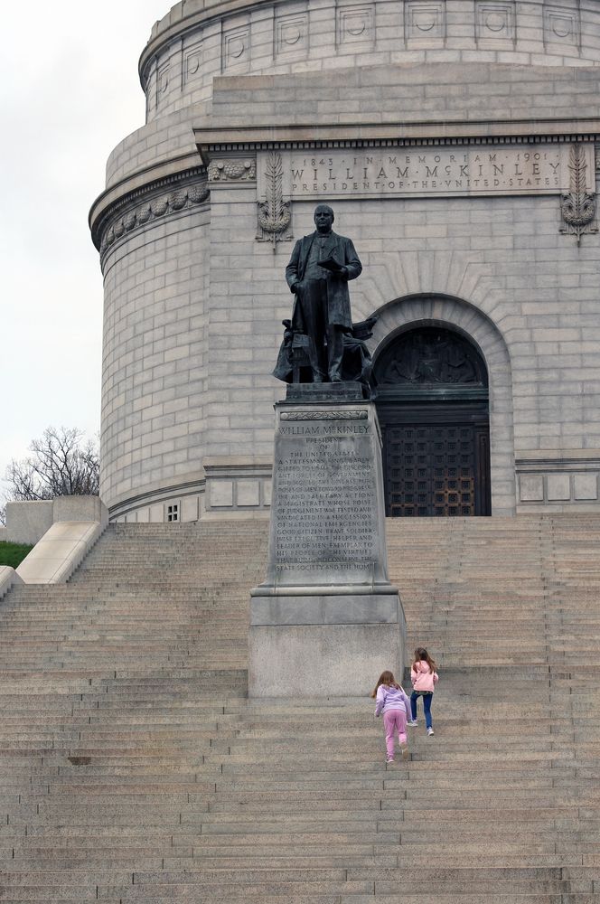 Kids climbing the stairs at William McKinley National Memorial