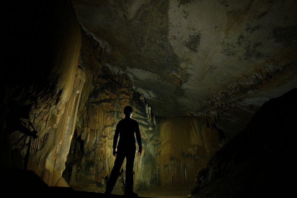 A man exploring the Worley's Cave