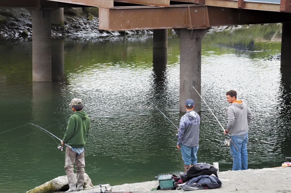 People fishing at Ship Creek's banks