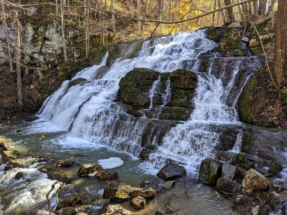 Waters cascading down the rocks of logan creek waterfall.