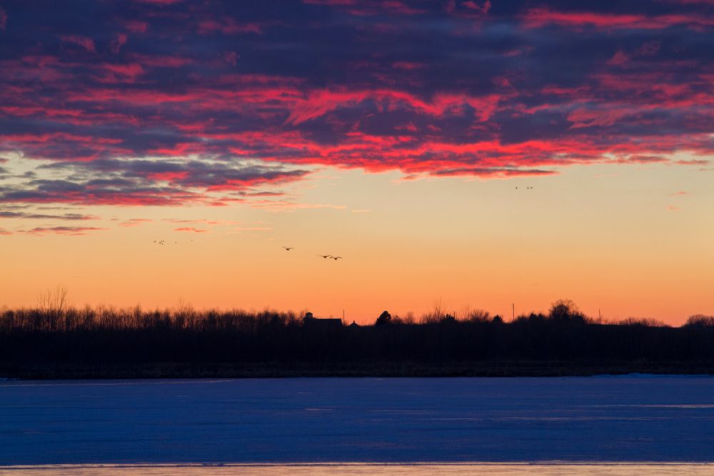 Colorful sunset over Ada Hayden Heritage Park Lake