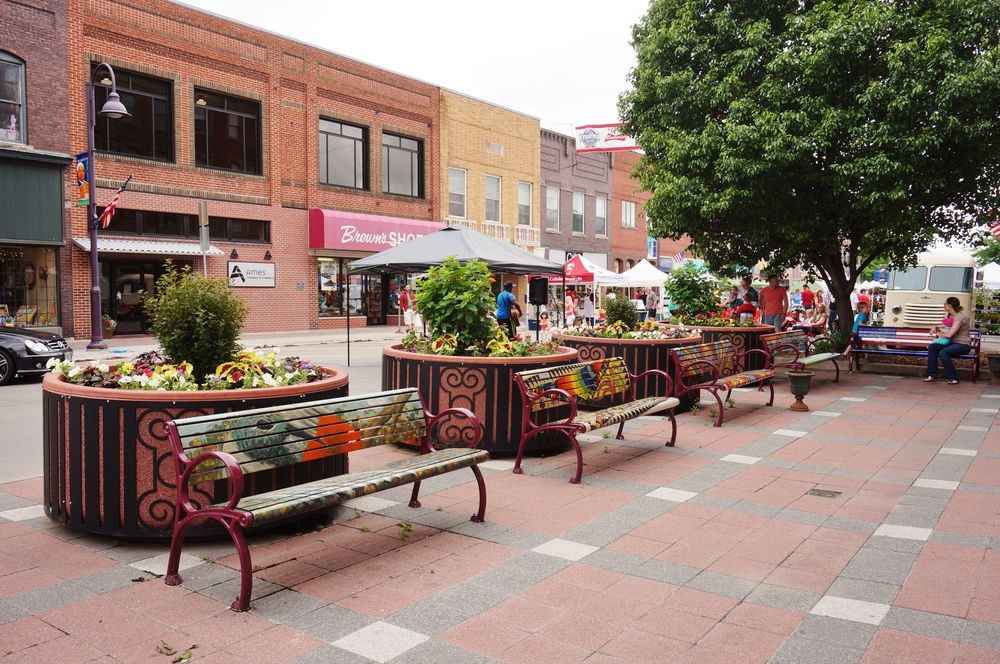 Metal benches on the grounds of Ames Main Street