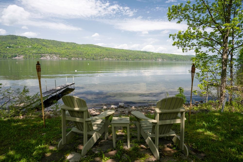 Wooden chairs overlooking Lake Champlain