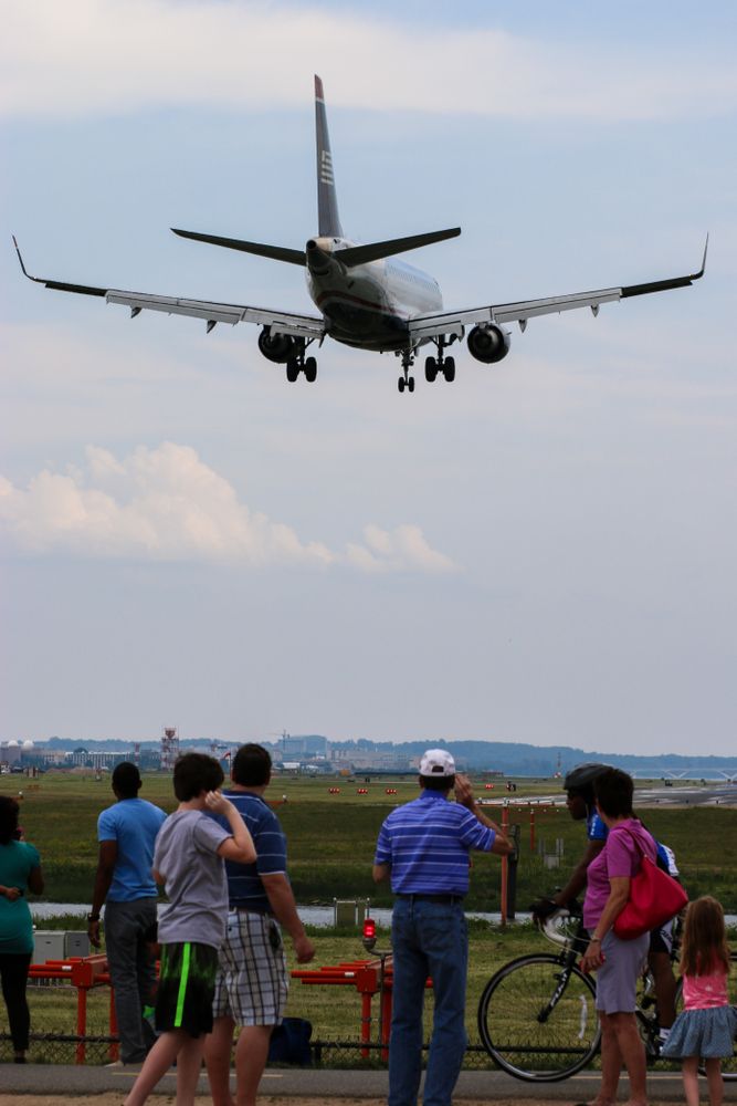 People watching a plane at Gravelly Point