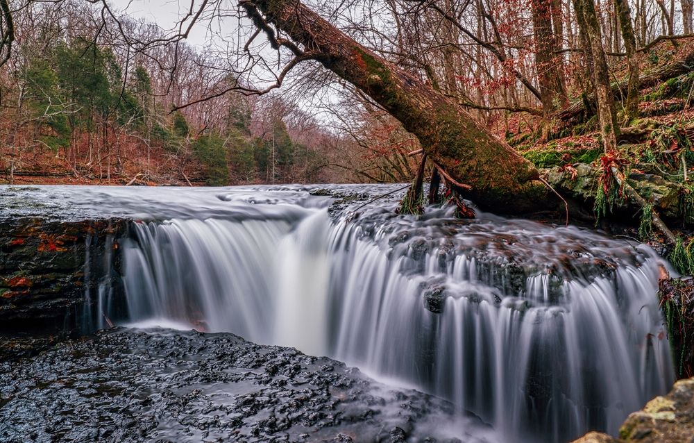 A waterfall at Old Stone Fort State Archaeological Park