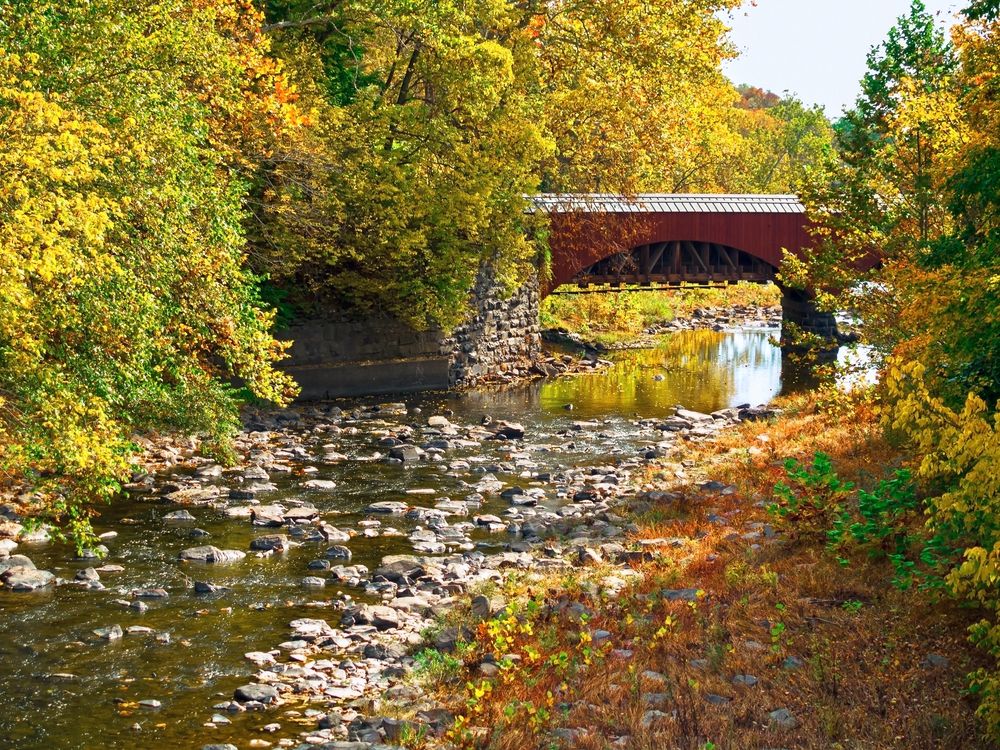Bridge over Delaware Canal State Park's rocky water
