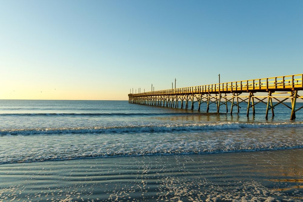 Small waves under the Sunset Beach Fishing Pier