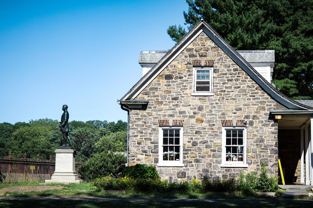 A statue beside the Van Cortlandt House Museum