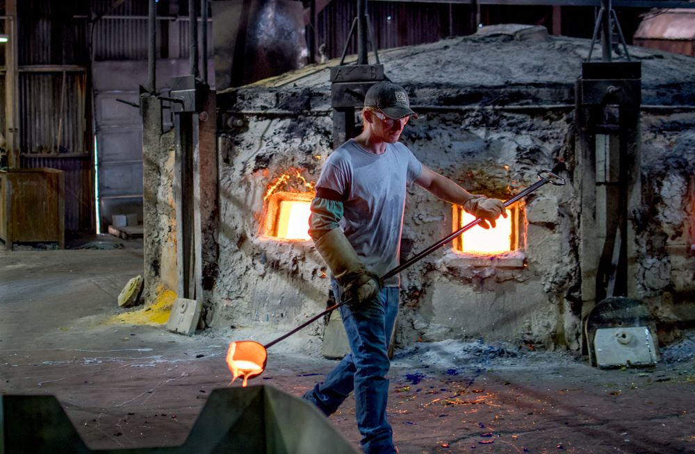A Worker Inside of Kokomo Opalescent Glass