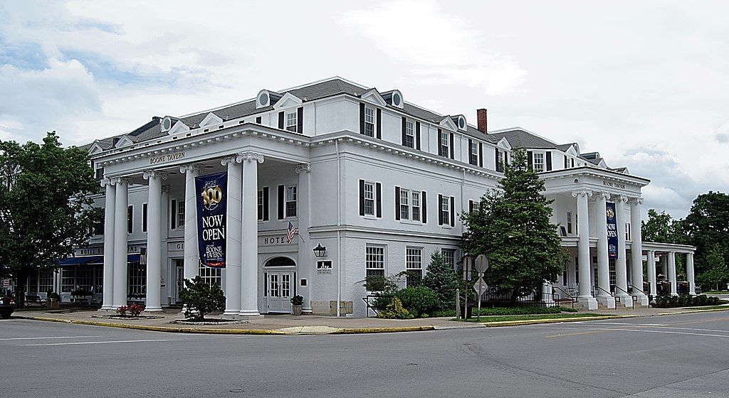 Exterior of the white building of boone tavern hotel.