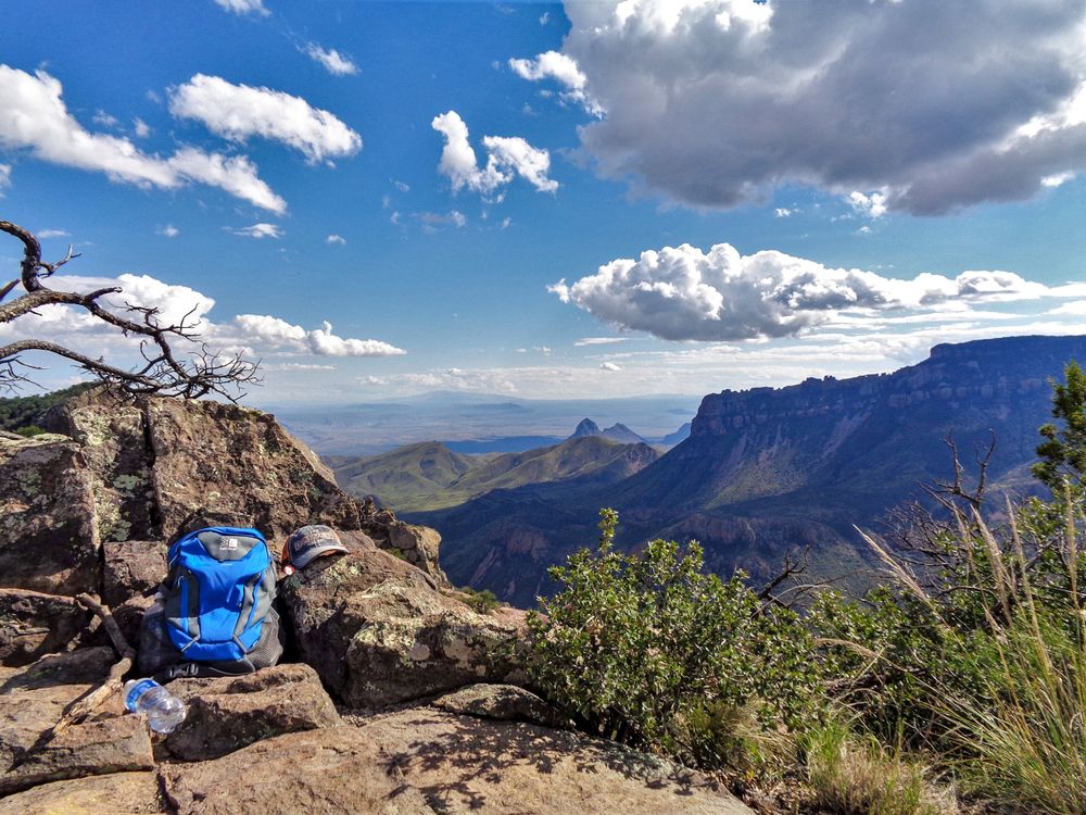 A backpack and a hat on Lost Mine Trail's peak