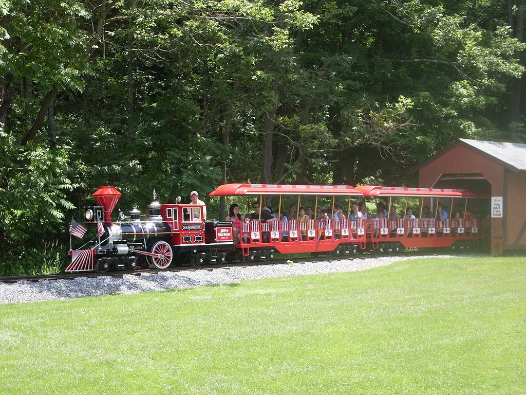 Tourists riding the Land of Make Believe's train