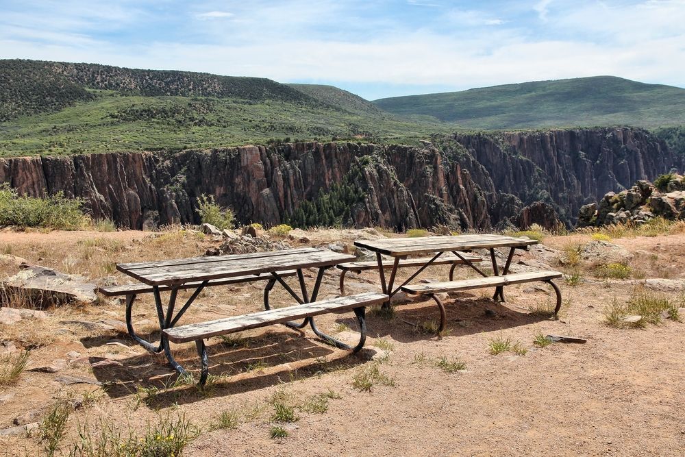 Picnic tables overlooking the black canyon