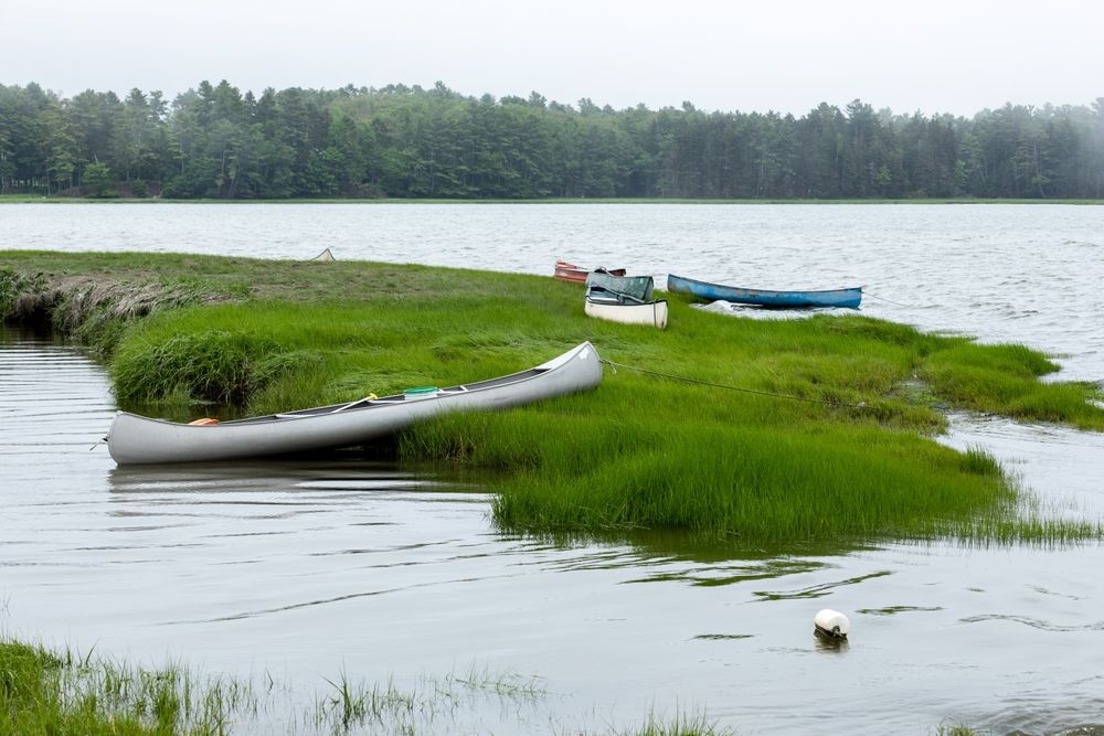 Canoes docked at Maquoit Bay