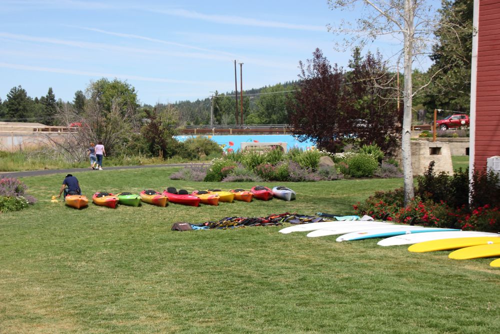 Boats on the grounds of Old Mill District