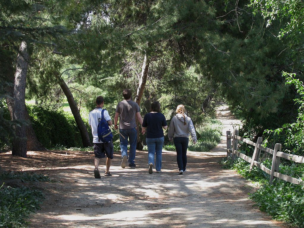 People walking along Ralph B. Clark Regional Park's trail