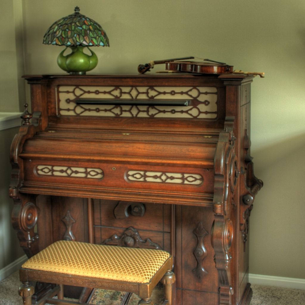 A pump organ instrument made by Estey Organ Company