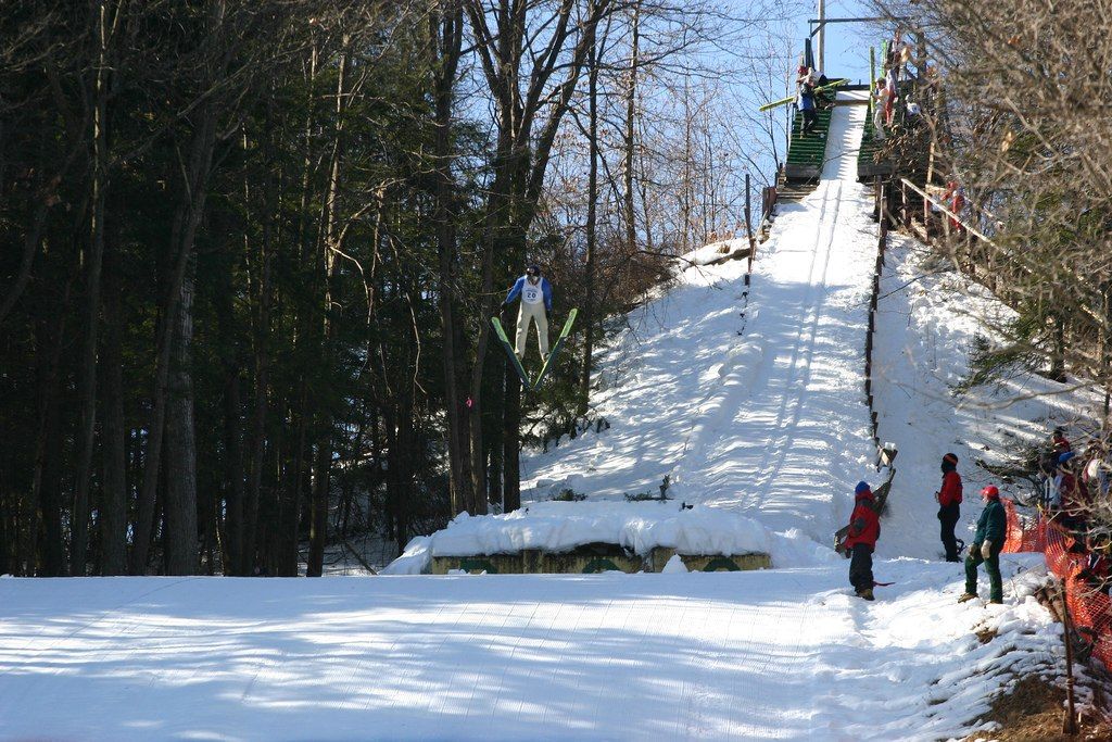 People ski jumping at brattleboro during winter