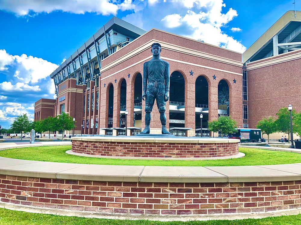 A statue of a man at kyle field.
