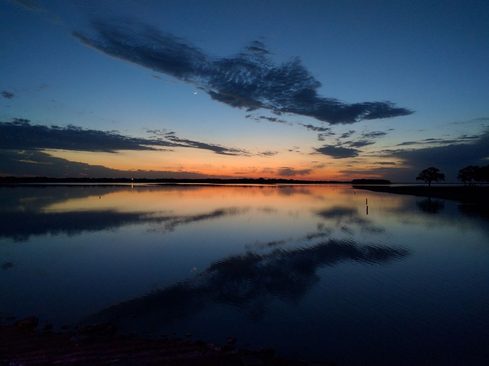Sunset reflecting on lake bryan.