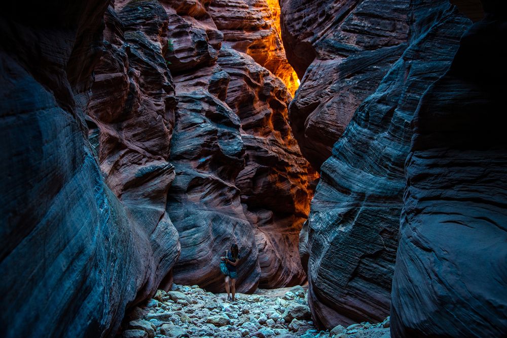 A woman hiking in Buckskin Gulch