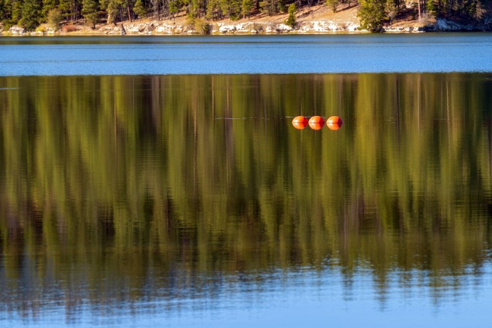 Three buoys on the water of Lake Britton