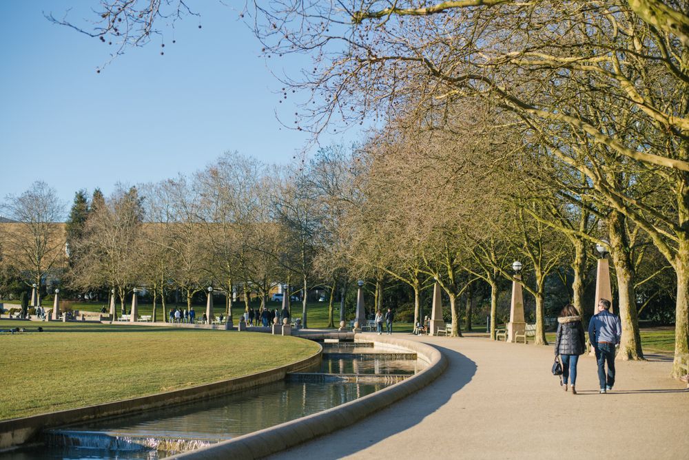 People walking along Bellevue Downtown Park