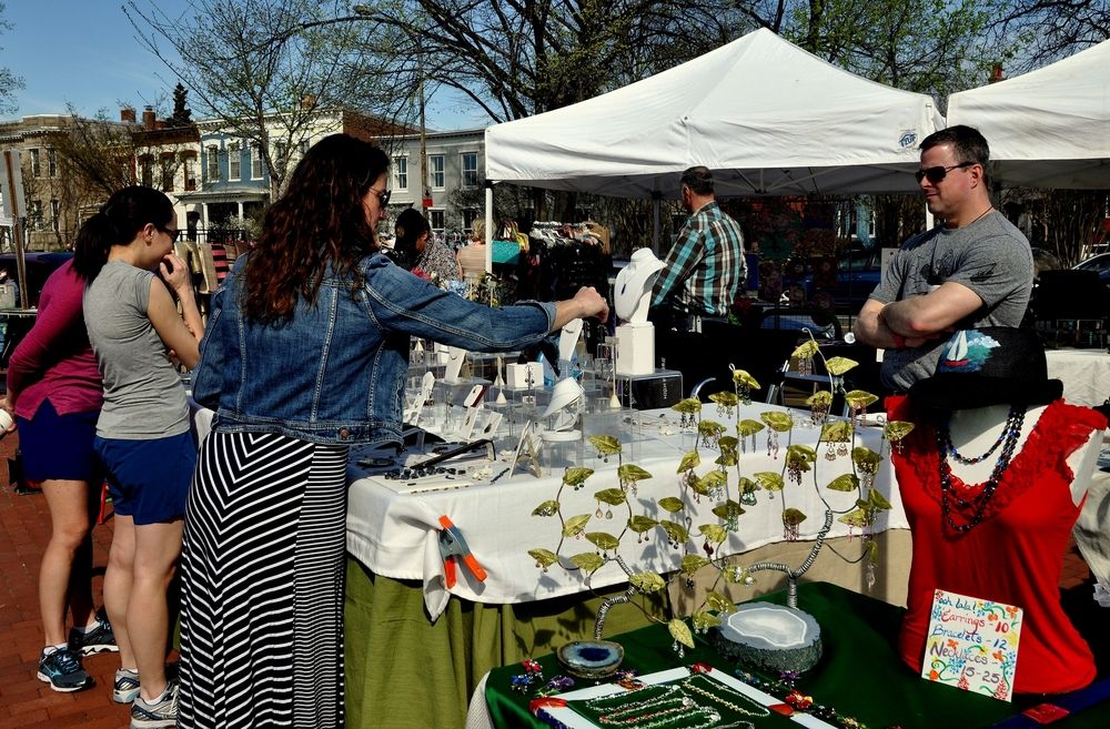 A woman buying jewellery at Eastern Market
