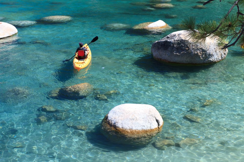 A person kayaking on Lake Tahoe